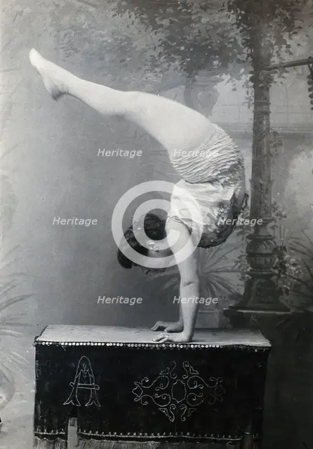 A Bulgarian female acrobat standing on her hands, early 20th century. Creator: Unknown.