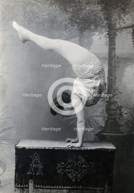 A Bulgarian female acrobat standing on her hands, early 20th century. Creator: Unknown.
