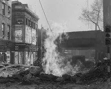 A Burning Bomb Crater, 1940. Creator: British Pathe Ltd