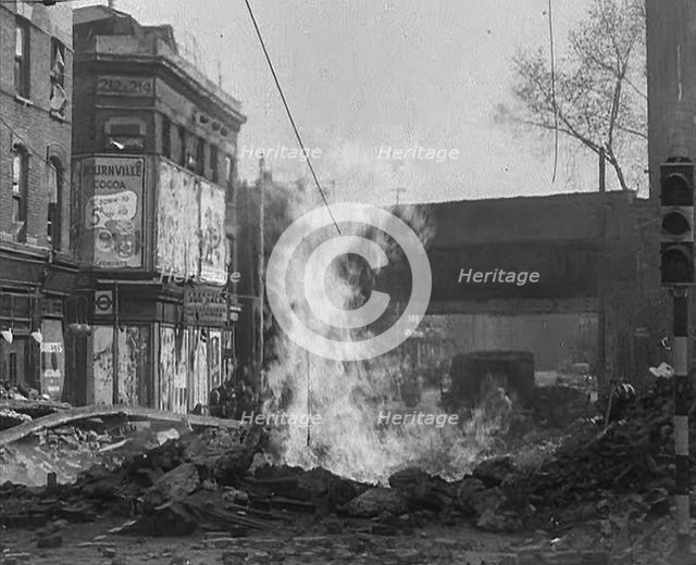 A Burning Bomb Crater, 1940. Creator: British Pathe Ltd.