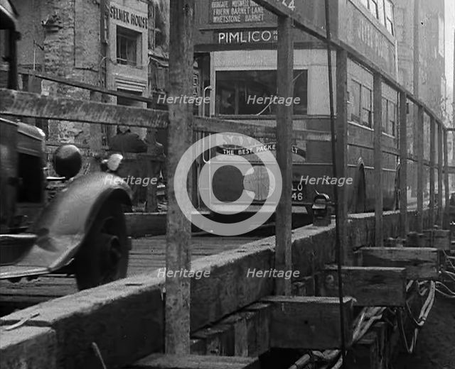 A Bus Driving Across a Wooden Bridge, 1940. Creator: British Pathe Ltd.