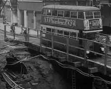 A Bus Driving Across a Wooden Bridge, 1940. Creator: British Pathe Ltd
