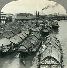 A Busy Scene on the Pasig River, Manila, Island of Luzon, P.I. - Cascos, the Cargo Lighters and Coa Creator: Unknown