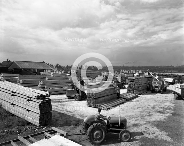 A busy timber yard, Bolton upon Dearne, South Yorkshire, 1960.  Creator: Michael Walters.