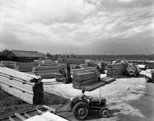 A busy timber yard, Bolton upon Dearne, South Yorkshire, 1960. Creator: Michael Walters