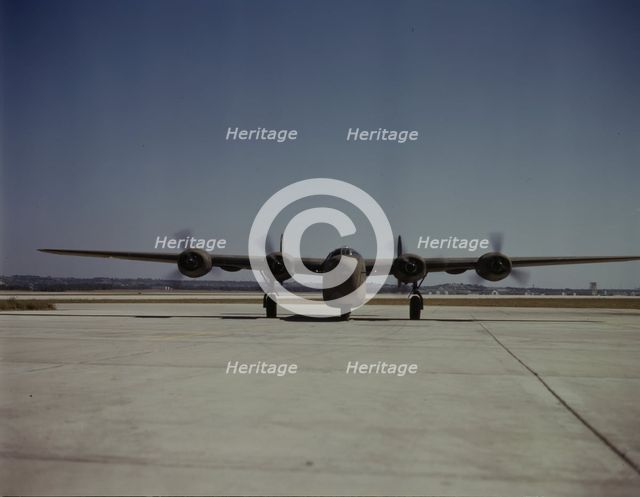 A C-87 transport plane, just off the assembly...Consolidated Aircraft..., Fort Worth, Texas, 1942. Creator: Howard Hollem.