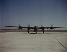 A C-87 transport plane, just off the assembly...Consolidated Aircraft..., Fort Worth, Texas, 1942. Creator: Howard Hollem