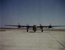 A C-87 transport plane, just off the assembly...Consolidated Aircraft..., Fort Worth, Texas, 1942. Creator: Howard Hollem