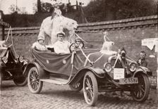 A car advertising Fox's Glacier Mints at a gala, 1926