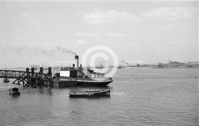 A car ferry unloads at Gravesend, Kent, c1945-c1965. Artist: SW Rawlings