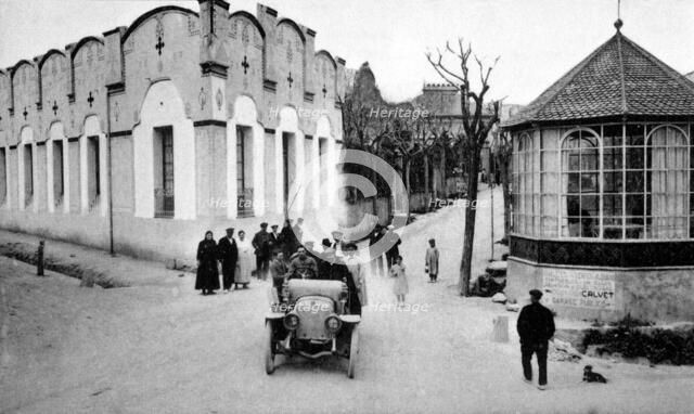 A car in the Promenade of Castellterçol village (Barcelona) in the early 20th century, photograph…