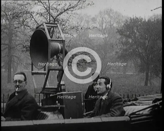 A Car on the Road Equipped with a Radio, an Aerial, and Speakers, 1922. Creator: British Pathe Ltd.