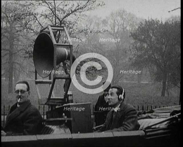 A Car on the Road Equipped with a Radio, an Aerial, and Speakers, 1922. Creator: British Pathe Ltd.