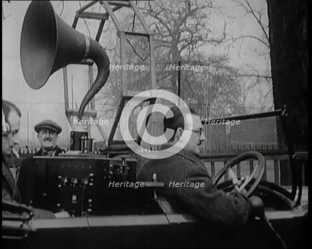 A Car on the Road Equipped with a Radio, an Aerial, and Speakers, 1922. Creator: British Pathe Ltd.
