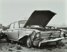 A car which has been dumped and abandoned by its owner, 1970. Creator: Unknown