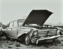 A car which has been dumped and abandoned by its owner, 1970. Creator: Unknown