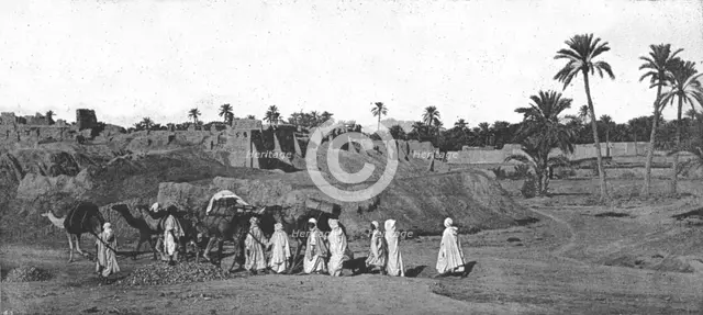 ''A Caravan approaching an old Fort in Biskra', 1890. Creator: Unknown.