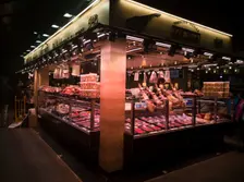 A charcuterie stall at La Bouqueria, Barcelona, Spain, 2020. Creator: Ethel Davies