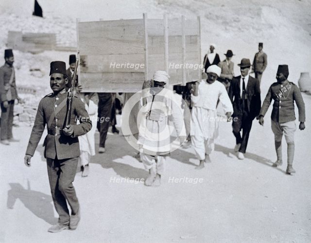 A chariot being removed from Tutankhamun's tomb, Valley of the Kings, Egypt, 1920s. Creator: Harry Burton.