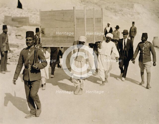 A chariot being removed from Tutankhamun's tomb, Valley of the Kings, Egypt, 1920s. Artist: Harry Burton