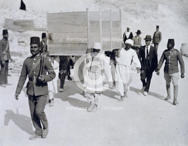 A chariot being removed from Tutankhamun's tomb, Valley of the Kings, Egypt, 1920s. Artist: Harry Burton
