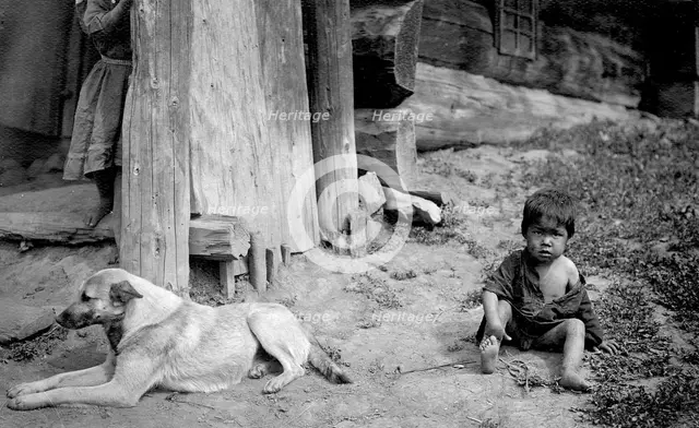 A Child with a Dog by a Yurt, 1913. Creator: GI Ivanov.