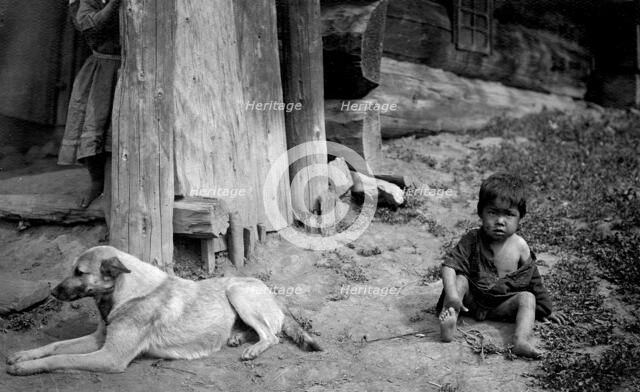A Child with a Dog by a Yurt, 1913. Creator: GI Ivanov.