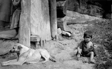 A Child with a Dog by a Yurt, 1913. Creator: GI Ivanov