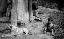 A Child with a Dog by a Yurt, 1913. Creator: GI Ivanov