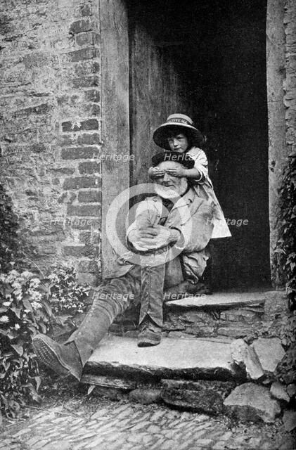 A child with her grandfather, England, c1922.Artist: AW Cutler