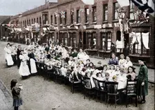 A children's tea party in an East End Street in London, to celebrate the Treaty of Versailles at t