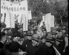 A Chinese Anti-War Protest With Male Attendees Both Military and Civilian Present Some..., 1938. Creator: British Pathe Ltd