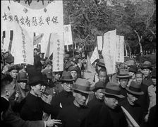 A Chinese Anti-War Protest With Male Attendees Both Military and Civilian Present Some..., 1938. Creator: British Pathe Ltd