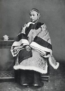 A Chinese lady of high rank in full dress costume, 1902