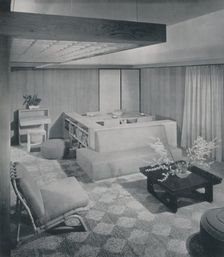 A combination living and dining room 1942