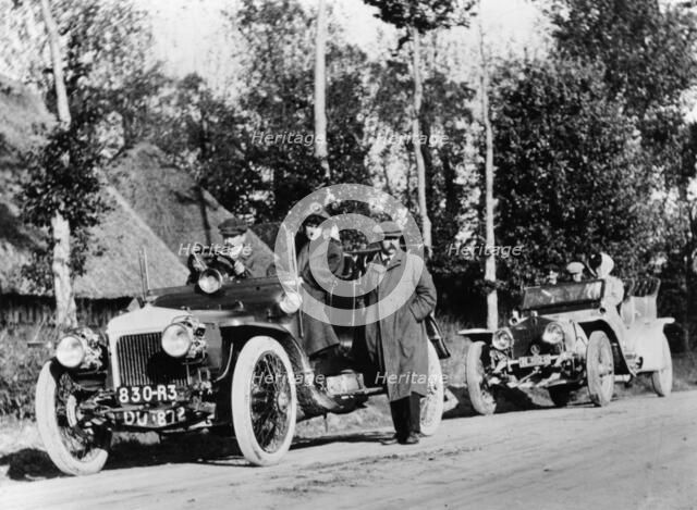 A comparative trial between a Daimler and Rolls Royce Silver Ghost, c1909. Artist: Unknown