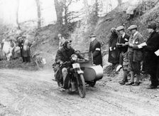 A competitor riding a Norton, competing in the Colmore Cup Trial, 1921