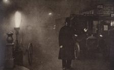 A constable directing traffic in the fog, London, c1910s-c1920s(?). Creator: Unknown