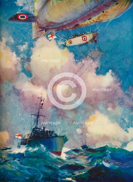 'A coast patrol airship sending a despatch by motor launch', c1919 (1919).. Artist: Frank Henry Mason.