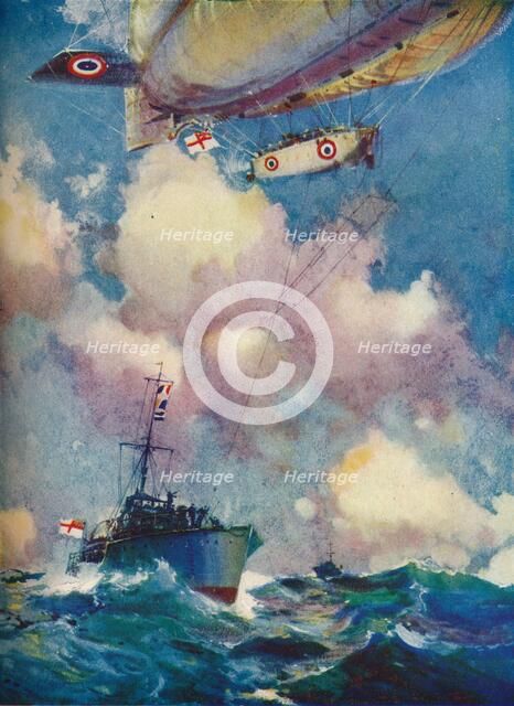 'A coast patrol airship sending a despatch by motor launch', c1919 (1919).. Artist: Frank Henry Mason.