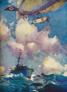 A coast patrol airship sending a despatch by motor launch c1919 (1919).. Artist: Frank Henry Mason