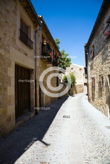 A cobbled street in Pedraza, Spain, 2007. Creator: Samuel Magal.
