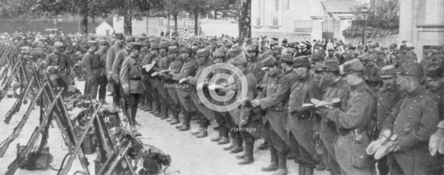 A colonel checking his soldiers' boots, Saint-Francois-Xavier, Paris, France, August 1914. Artist: Unknown