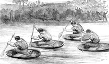 A coracle-race on the Severn, at Ironbridge, Shropshire, 1881. Creator: Unknown