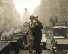 A Couple Dancing the Charleston on the Top of a Car Driving Down a London Street, 1926. Creator: British Pathe Ltd