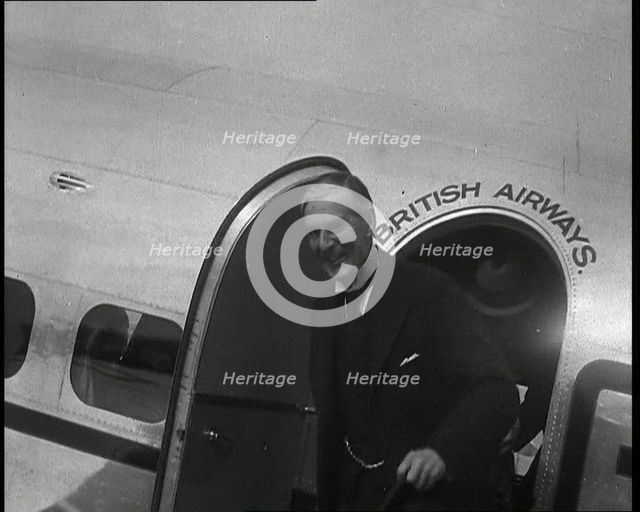 A Close up of a Smiling Neville Chamberlain, the British Prime Minister, Emerging from the..., 1938. Creator: British Pathe Ltd.