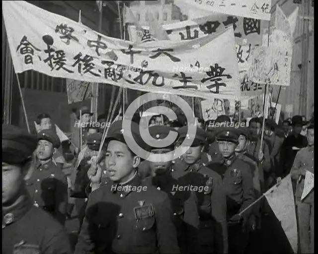A Close up of Male Chinese Soldiers at an Anti-War Protest Many of Whom Are Carrying..., 1938. Creator: British Pathe Ltd.