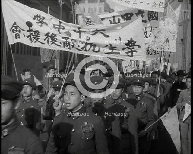 A Close up of Male Chinese Soldiers at an Anti-War Protest Many of Whom Are Carrying..., 1938. Creator: British Pathe Ltd.
