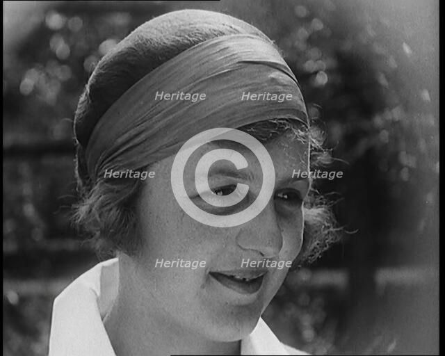 A Close up Shot of Betty May Nuthall Shoemaker, the British  World Top Female Tennis Player, 1920. Creator: British Pathe Ltd.