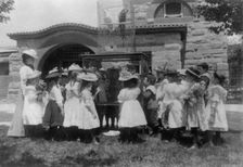 A class at the zoo - the bird cage, (1899?). Creator: Frances Benjamin Johnston